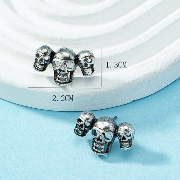 Any 4/$25! Antiqued Silver Triple Skull Stud Earrings - Picture 4 of 6